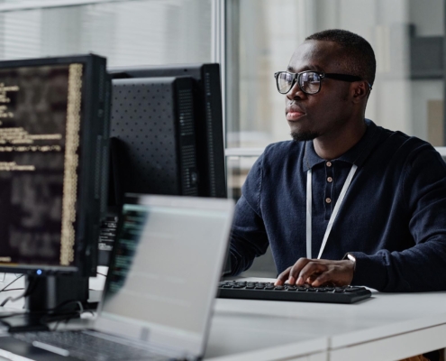 Tech professional working on computer